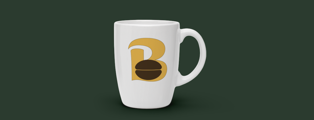 A white mug with a logo - a yellow B with a coffee bean in the B's lower hole - on a dark green background